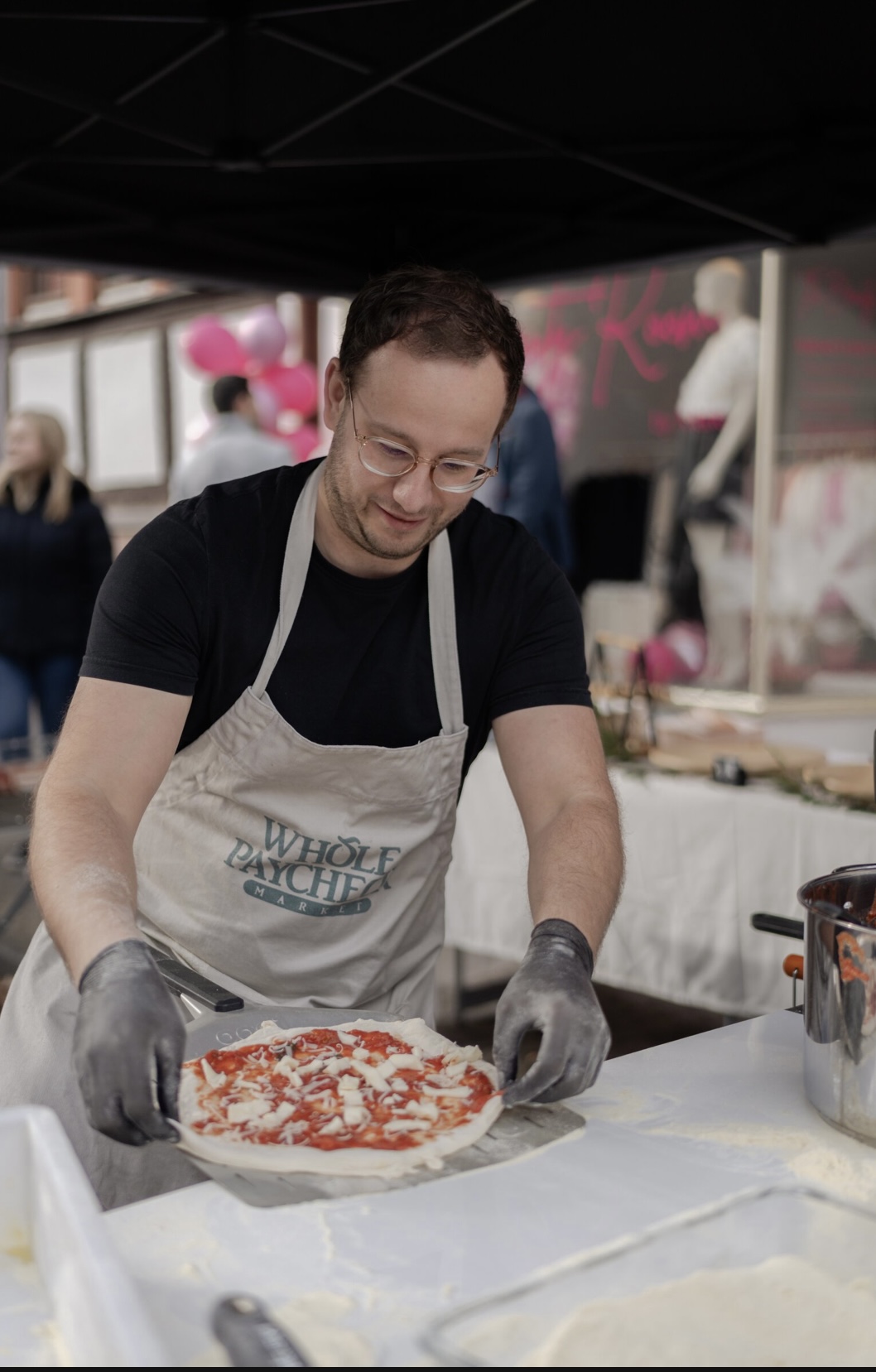 Marcel Dittrich making authentic Neapolitan pizza in his mobile wood-fired oven